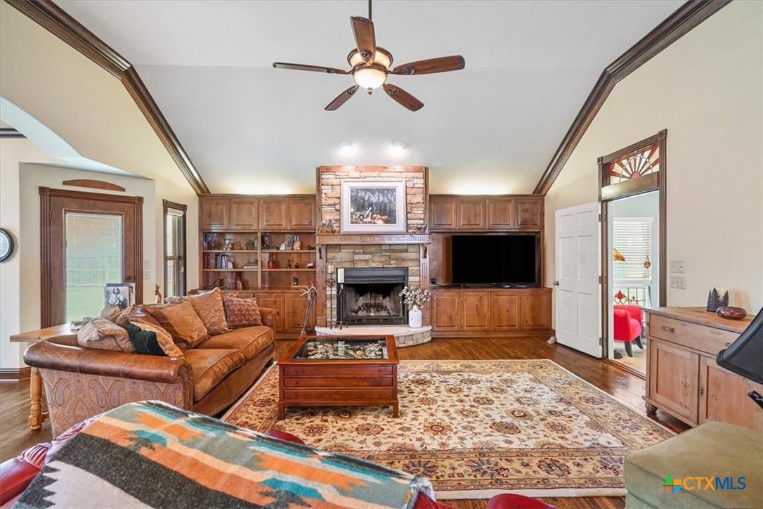 615 Benchmark Trail Belton, TX 76513 - Photo 17 of 36 a living room with furniture and a fireplace
