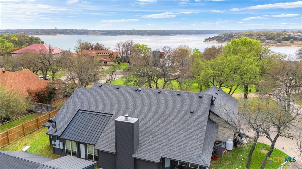 615 Benchmark Trail Belton, TX 76513 - Photo 2 of 36 a view of roof with wooden floor and outdoor seating
