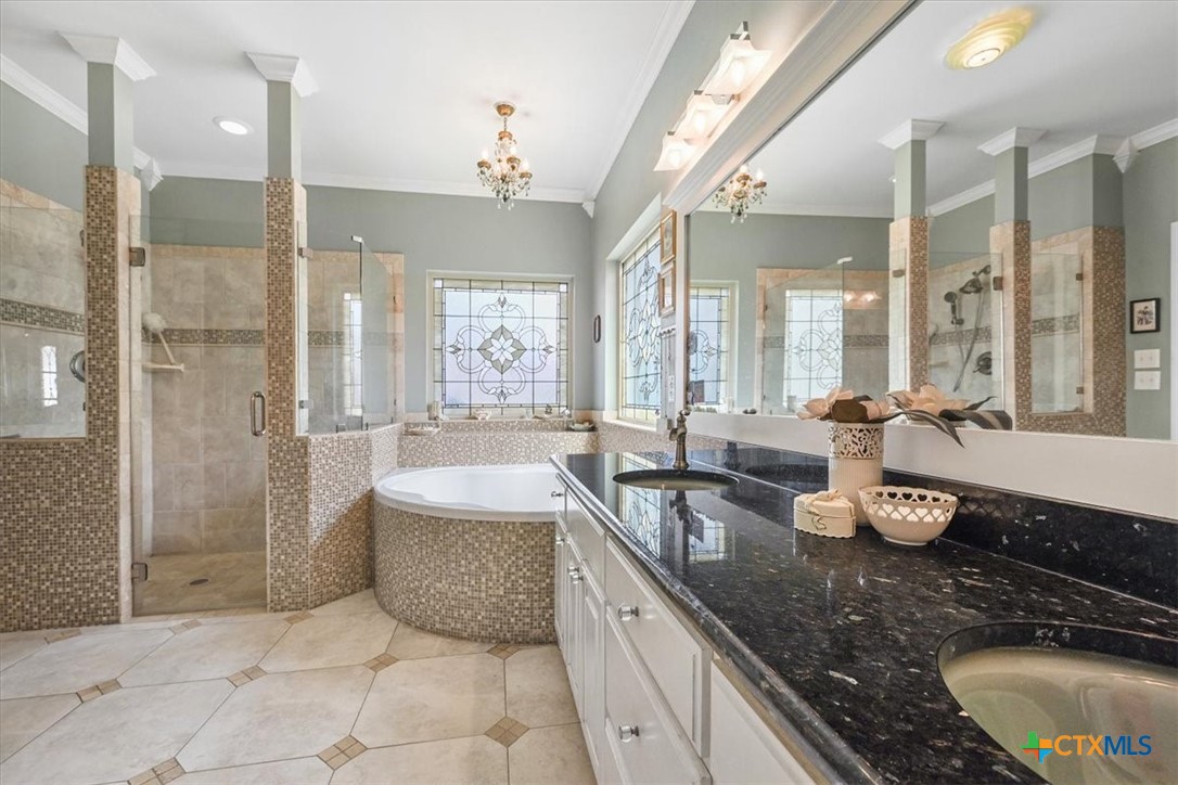 615 Benchmark Trail Belton, TX 76513 - Photo 23 of 36 a large kitchen with a large tub and sink