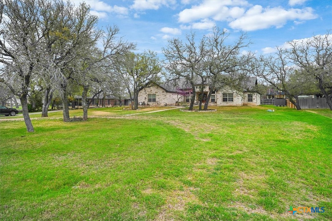 615 Benchmark Trail Belton, TX 76513 - Photo 4 of 36 a view of a park with large trees
