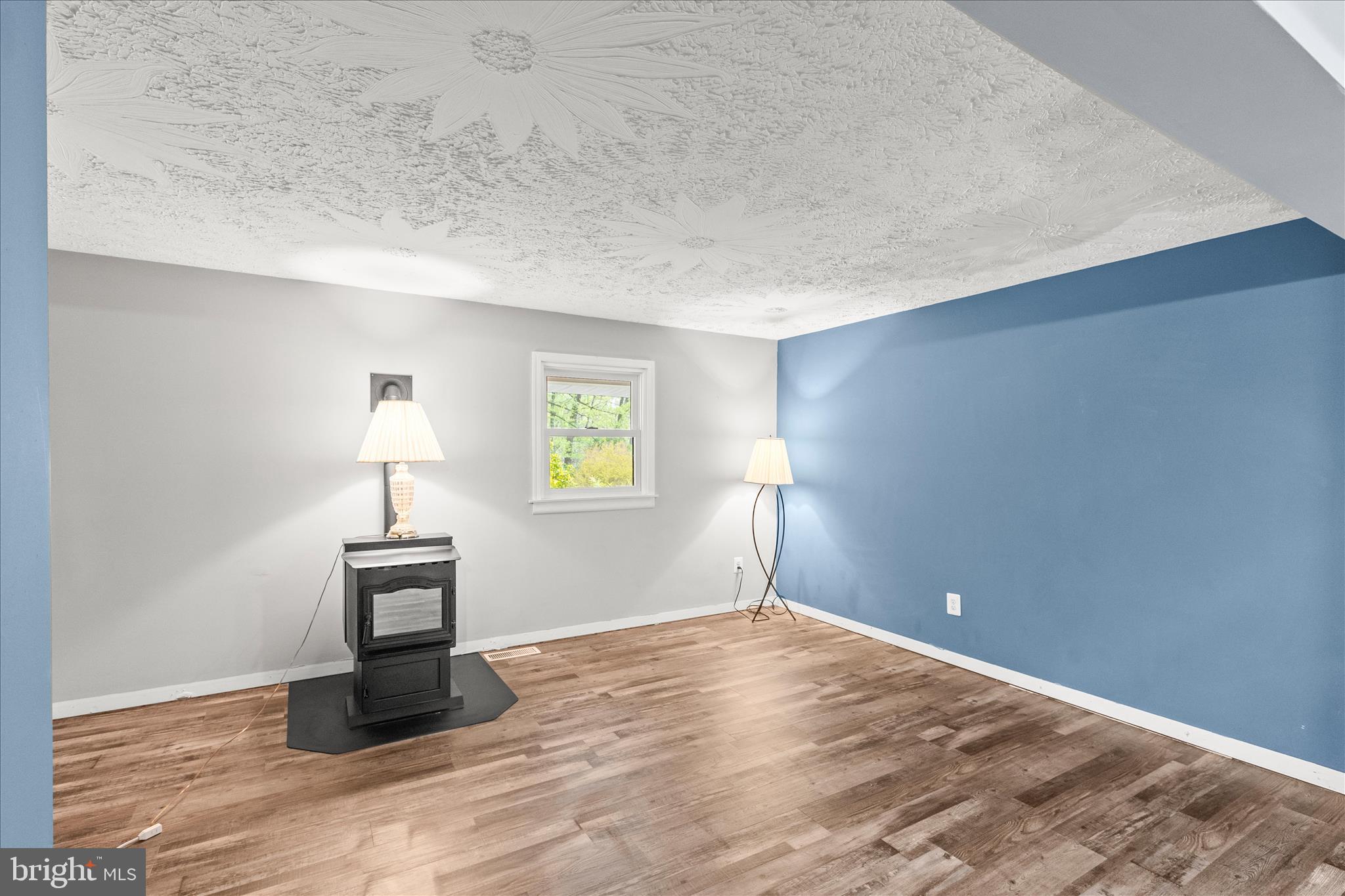 1426 Ridge Road Whiteford, MD 21160 - Photo 14 of 58 Living area with pellet stove