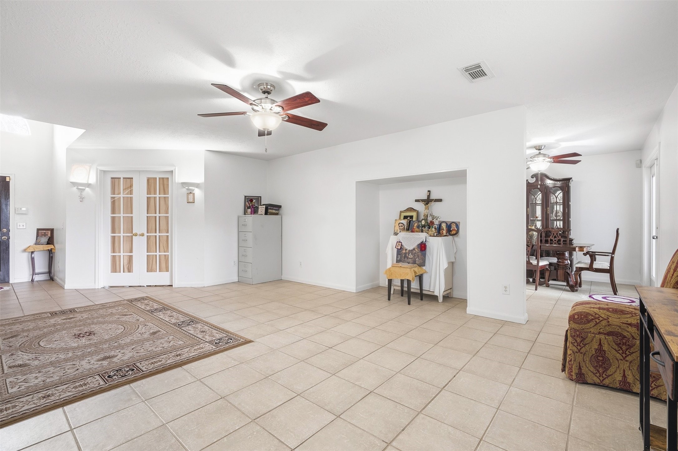 28723 Sedgefield Street Spring, TX 77386 - Photo 4 of 20 a bedroom with furniture and a chandelier
