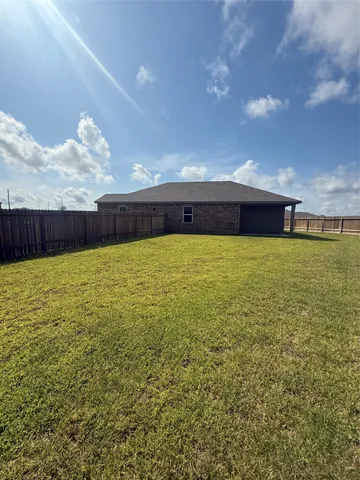 a view of a swimming pool and an outdoor space