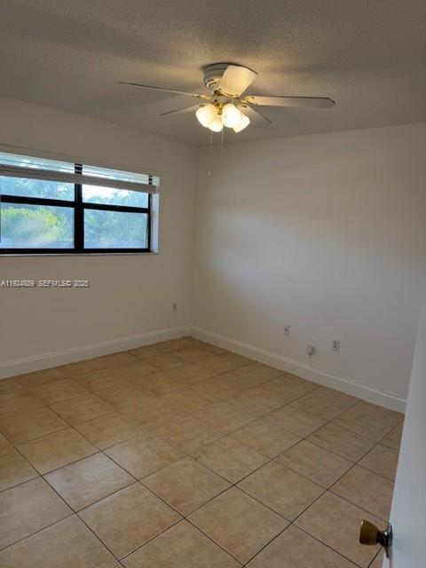 12960 Southwest 66th Lane, Unit 1031 Miami, FL 33183 - Photo 5 of 7 a view of an empty room
