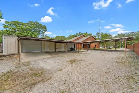 a view of house with a outdoor space