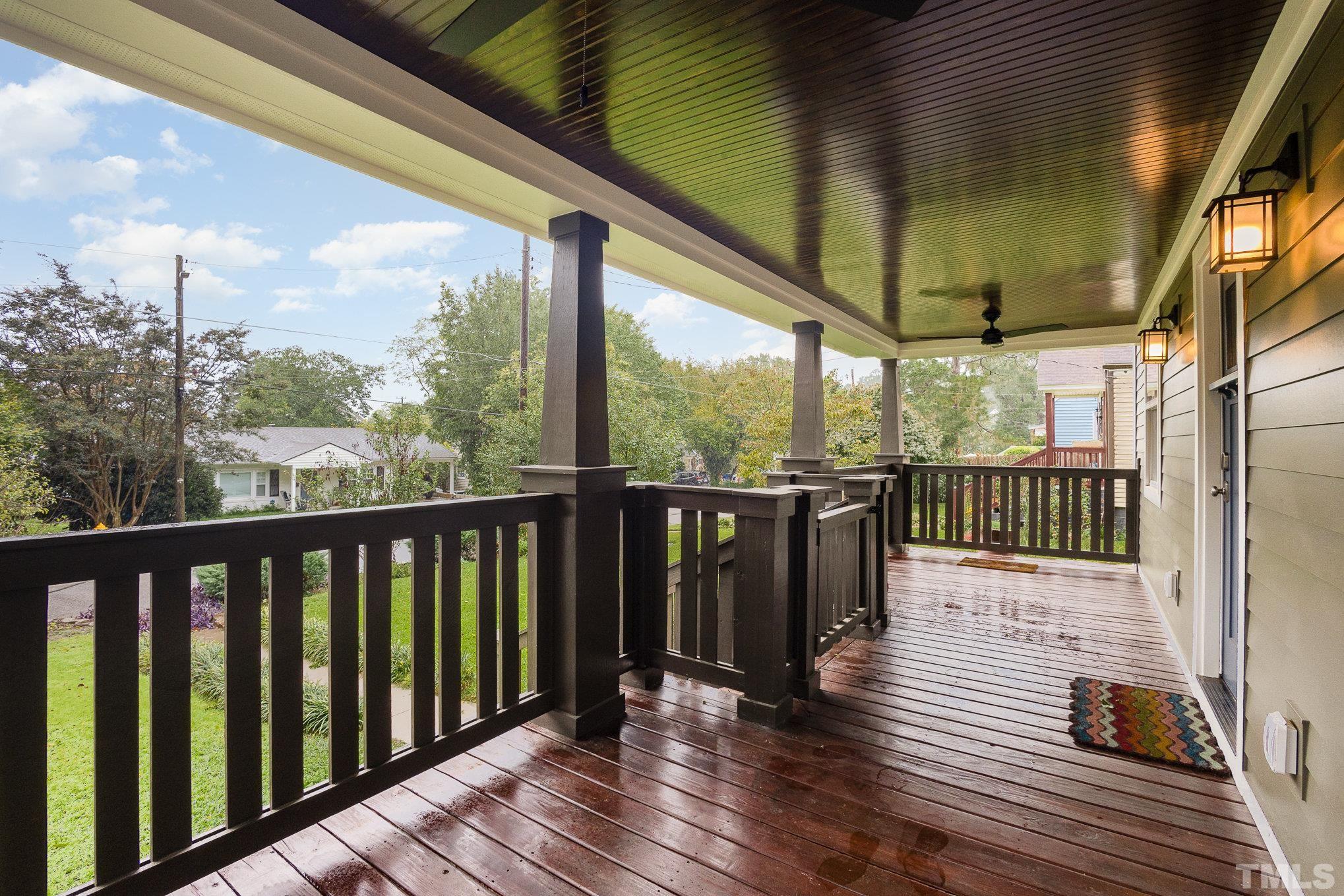 719 New Road Raleigh, NC 27608 - Photo 5 of 38 a view of a balcony with wooden floor