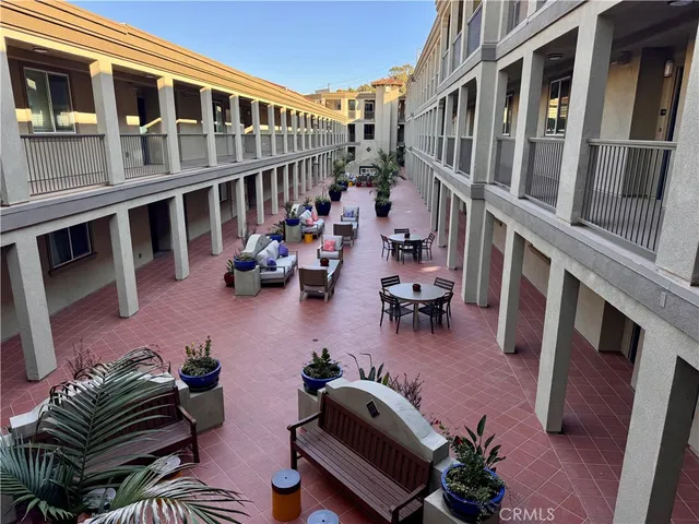 a bathroom with a bathtub a toilet and a shower