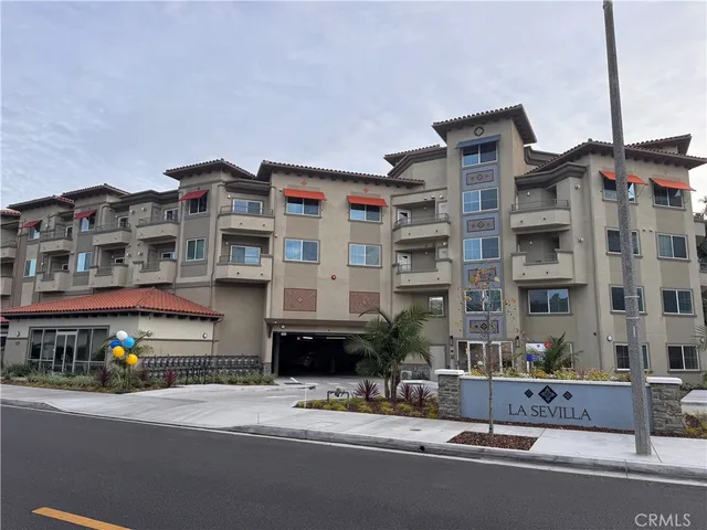 a front view of a building with street view