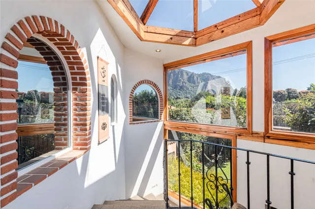 a view of a two chairs with an outdoor view