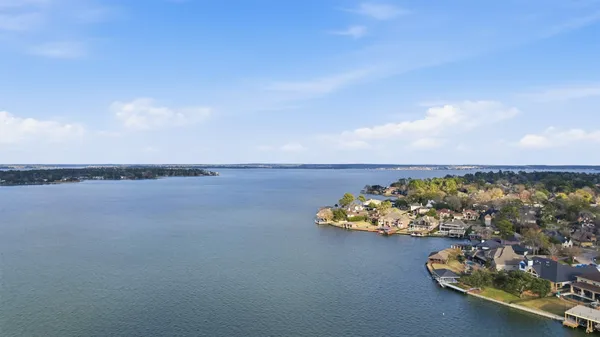 a wooden pier with boats in it