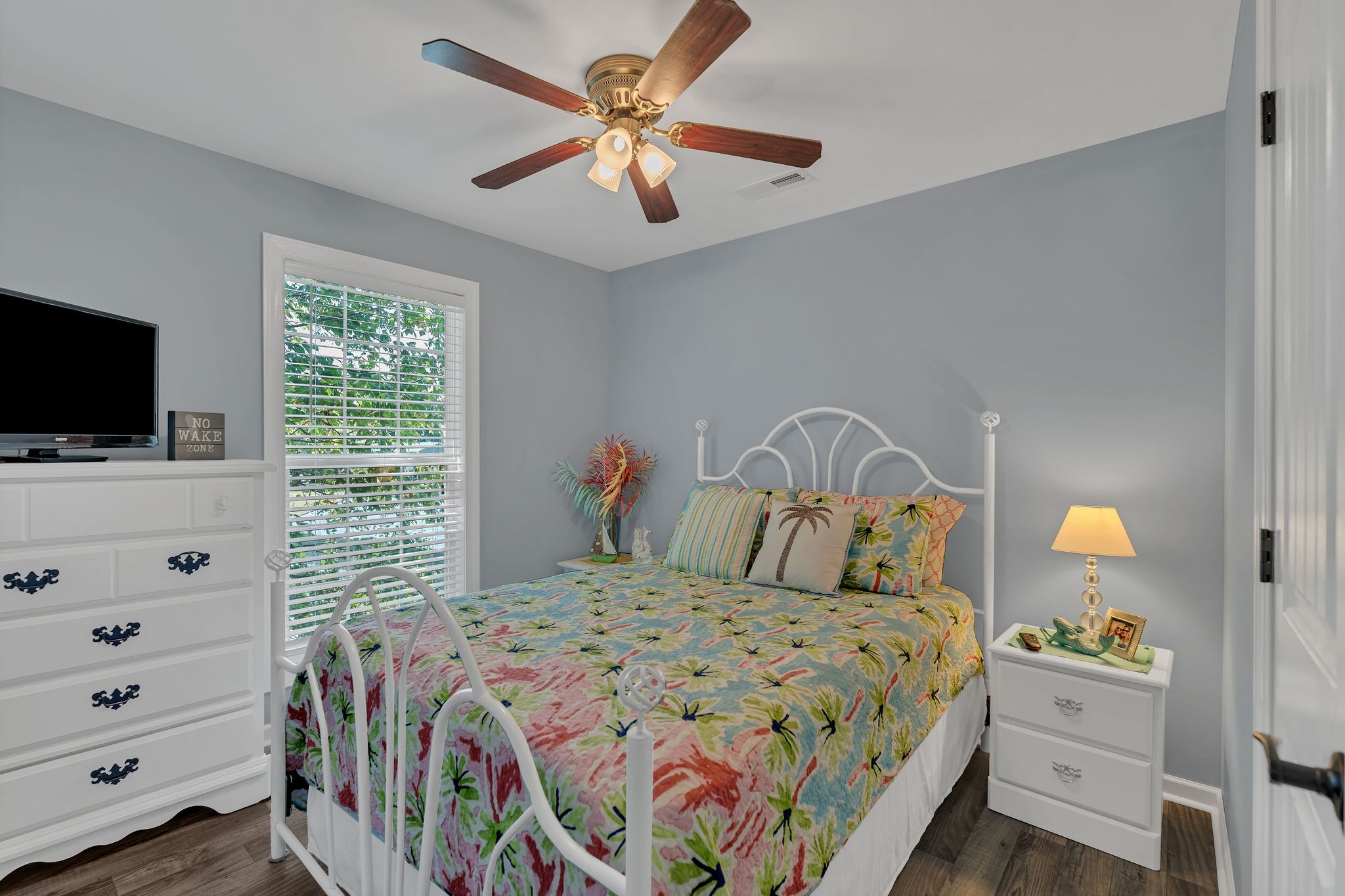 219 Tn River Estates Road Clifton, TN 38425 - Photo 18 of 38 a bedroom with a bed and a flat tv screen on dresser