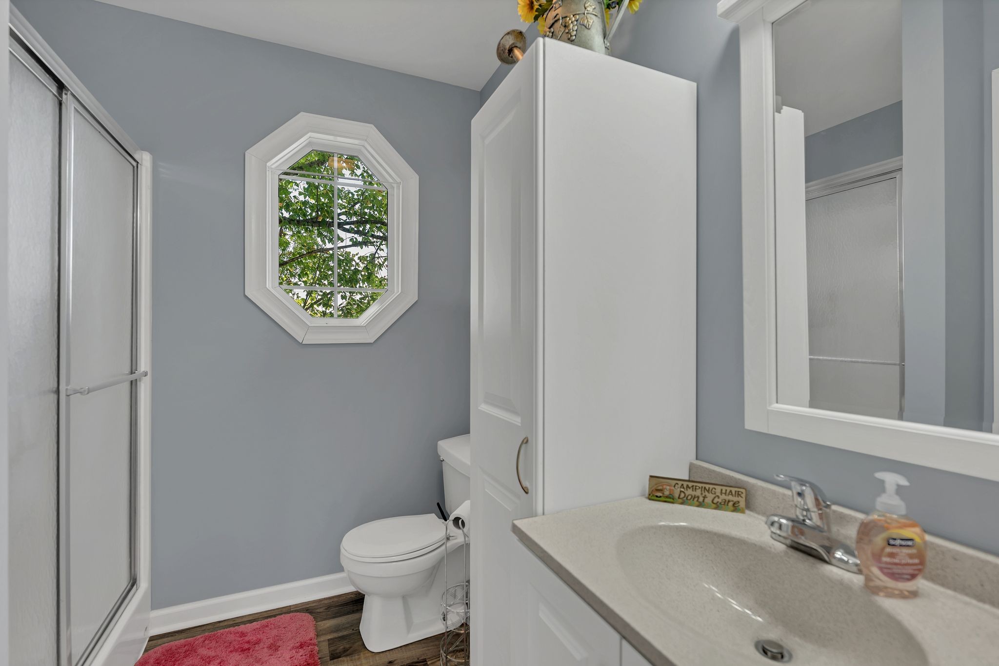 219 Tn River Estates Road Clifton, TN 38425 - Photo 21 of 38 a bathroom with a sink toilet and a mirror