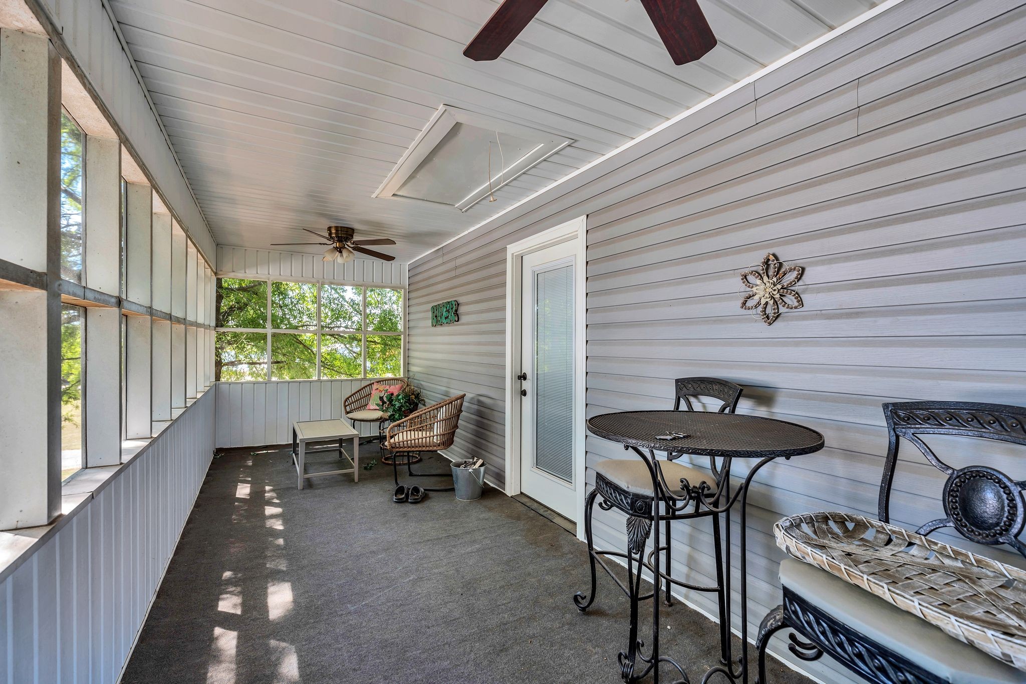219 Tn River Estates Road Clifton, TN 38425 - Photo 23 of 38 a view of a patio with chairs and table