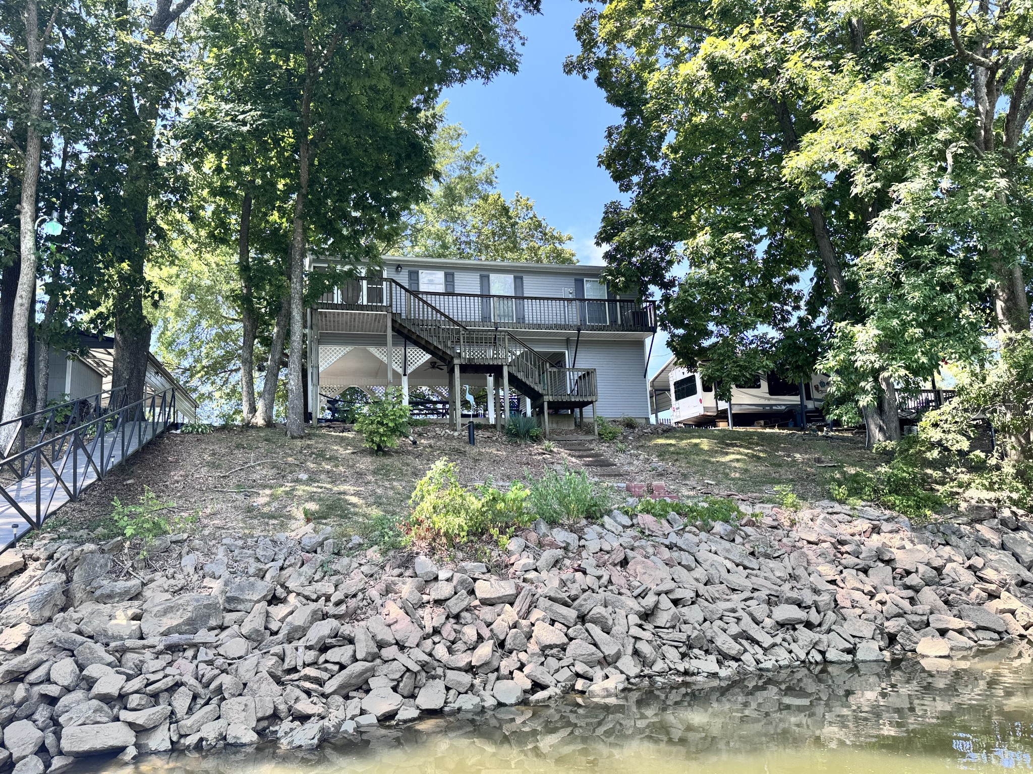219 Tn River Estates Road Clifton, TN 38425 - Photo 3 of 38 a view of a wooden bench sitting in a park