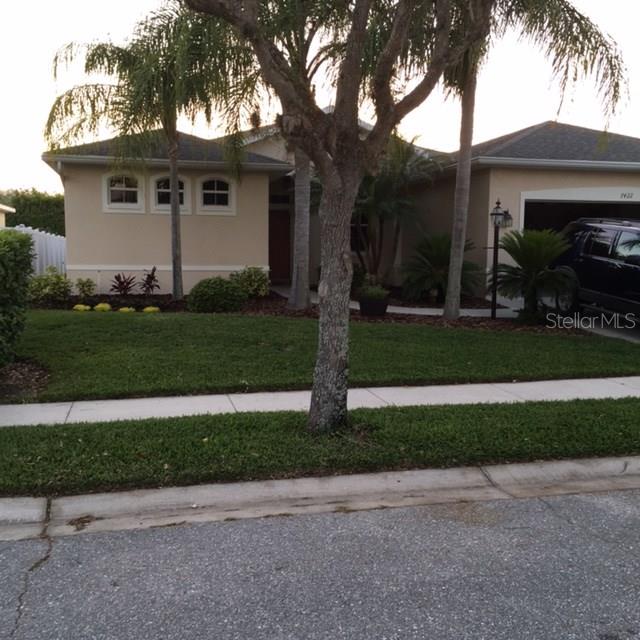 7422 Loblolly Bay Trail Lakewood Ranch, FL 34202 - Photo 1 of 1 a view of a yard in front of a house