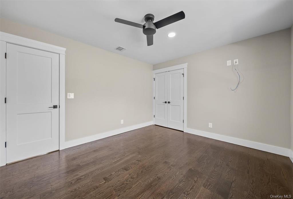 346 Shawanga Lodge Road Bloomingburg, NY 12721 - Photo 26 of 36 Empty room featuring ceiling fan and dark hardwood / wood-style flooring