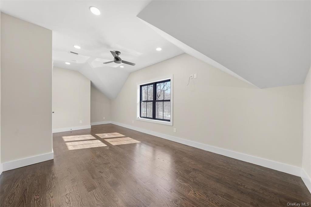 346 Shawanga Lodge Road Bloomingburg, NY 12721 - Photo 29 of 36 Additional living space with vaulted ceiling, ceiling fan, and dark wood-type flooring
