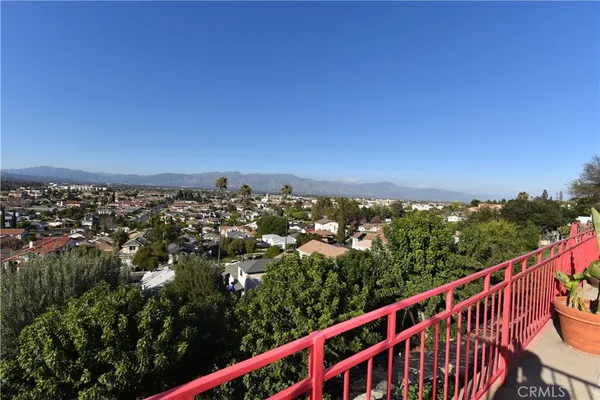 a view of a city from a balcony