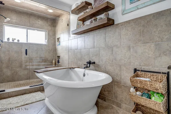 a bathroom with a sink and bathtub