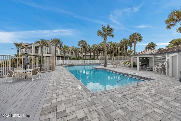 a view of a house with a swimming pool