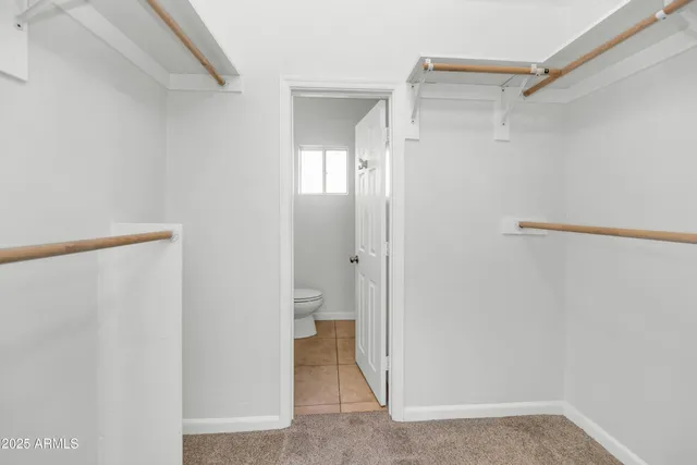 a bathroom with a granite countertop shower