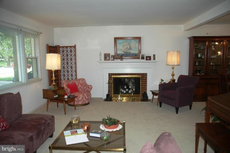 7008 Sea Cliff Road McLean, VA 22101 - Photo 2 of 6 Living room with fireplace