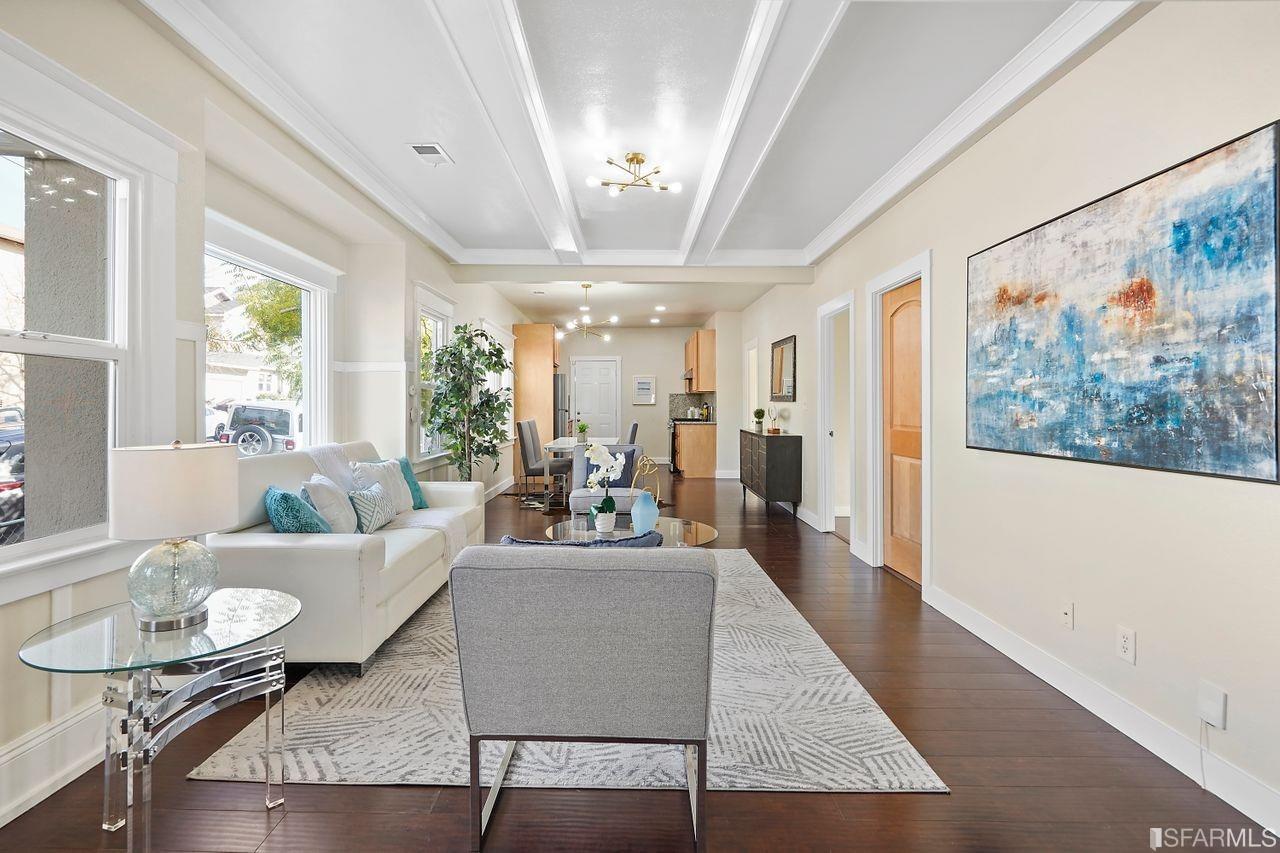 3036 14th Avenue Oakland, CA 94602 - Photo 1 of 35 a living room with furniture and a large window