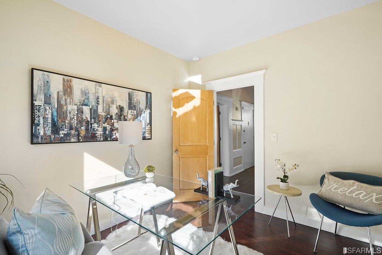 3036 14th Avenue Oakland, CA 94602 - Photo 11 of 35 a view of a dining room with furniture and wooden floor