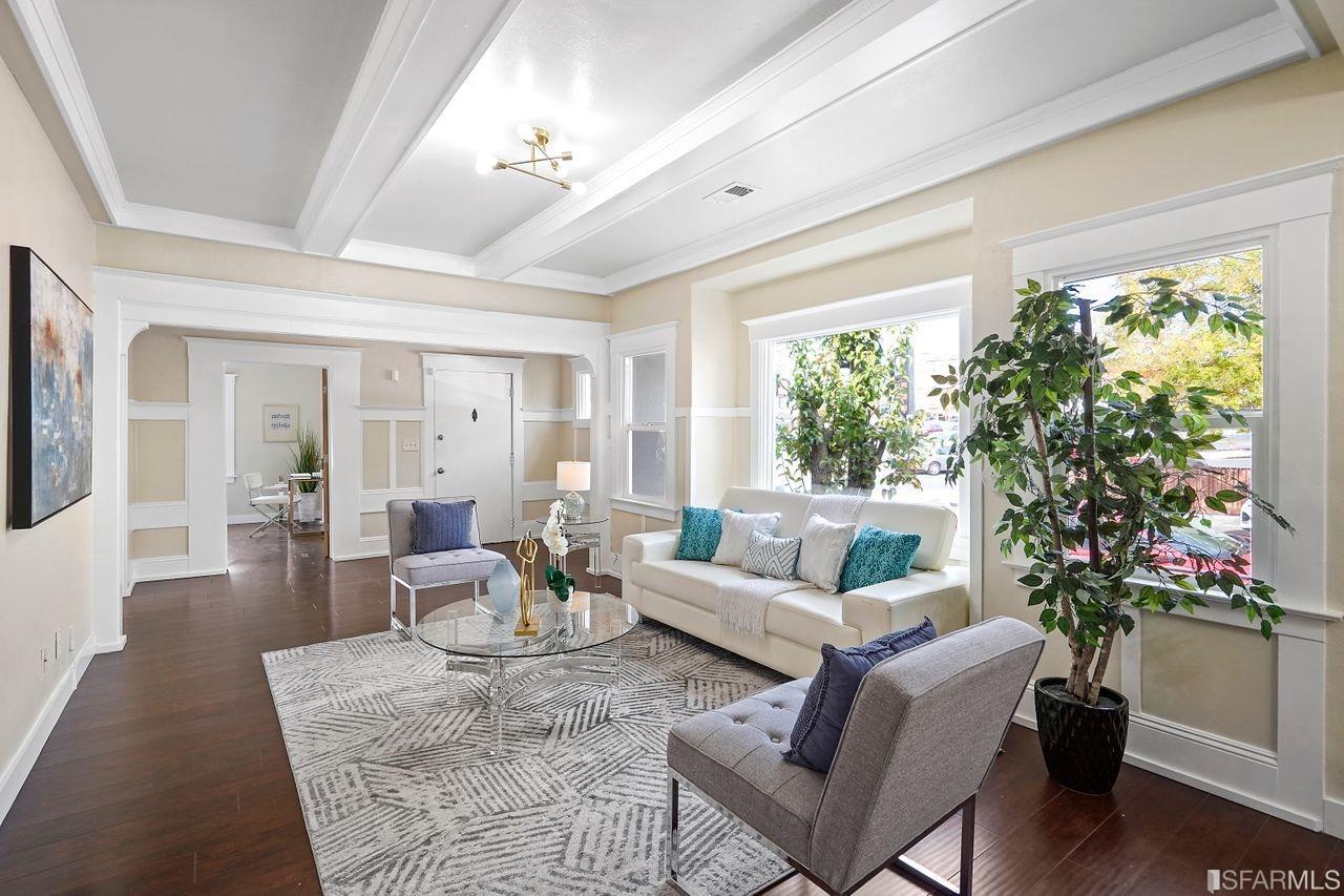 3036 14th Avenue Oakland, CA 94602 - Photo 18 of 35 a living room with furniture potted plant floor and a large window