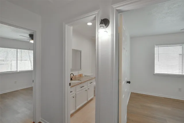 a view of bathroom with a wooden floor