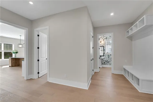 a view of a hallway with stairs