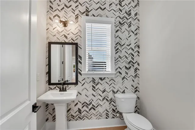 a view of a hallway with windows