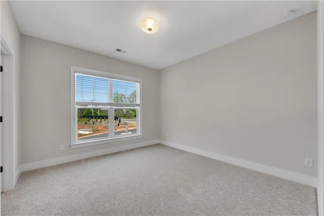 a view of a backyard with a garden