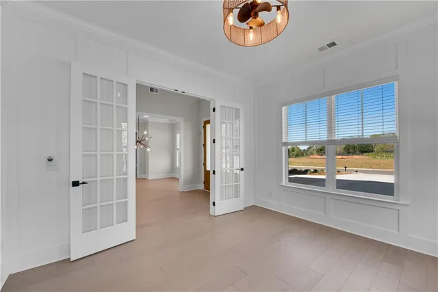 a view of a kitchen with a sink and a window