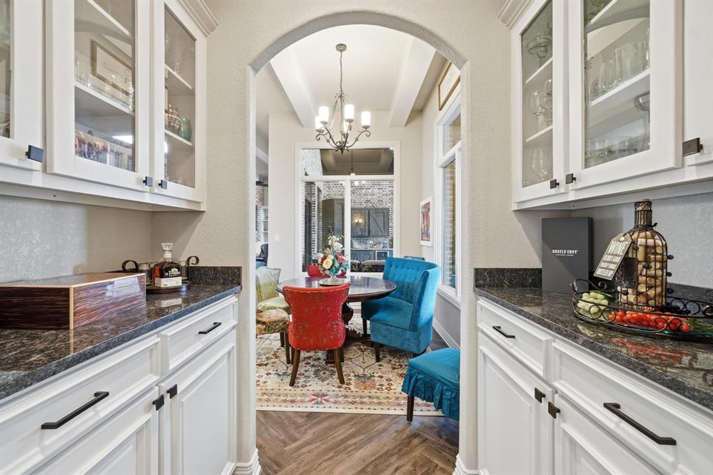 249 Rising Star Drive Abilene, TX 79606 - Photo 14 of 40 a living room with furniture a fireplace and potted plants