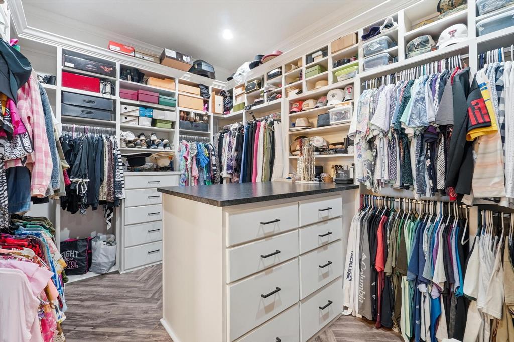 249 Rising Star Drive Abilene, TX 79606 - Photo 19 of 40 a view of walk in closet with clothes and shoes