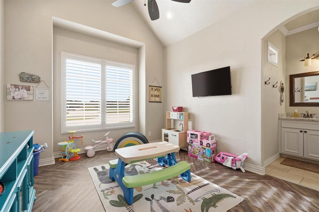 249 Rising Star Drive Abilene, TX 79606 - Photo 22 of 40 a living room with furniture and a flat screen tv