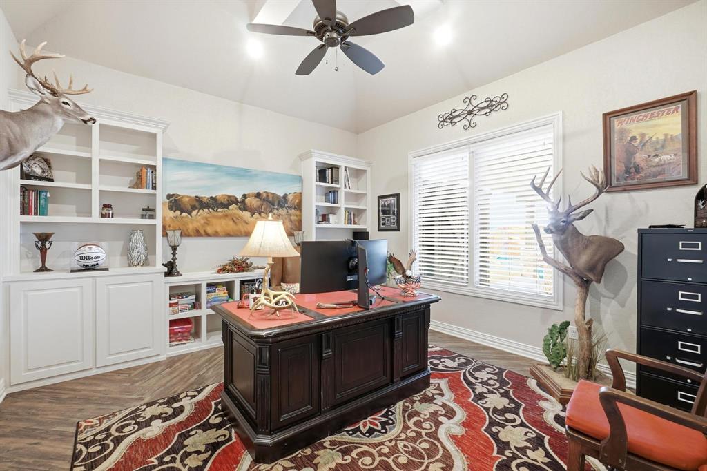 249 Rising Star Drive Abilene, TX 79606 - Photo 28 of 40 a room with furniture a flat screen tv and a window