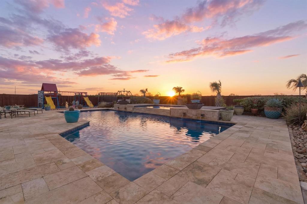 249 Rising Star Drive Abilene, TX 79606 - Photo 34 of 40 a lake view with a bench and trees