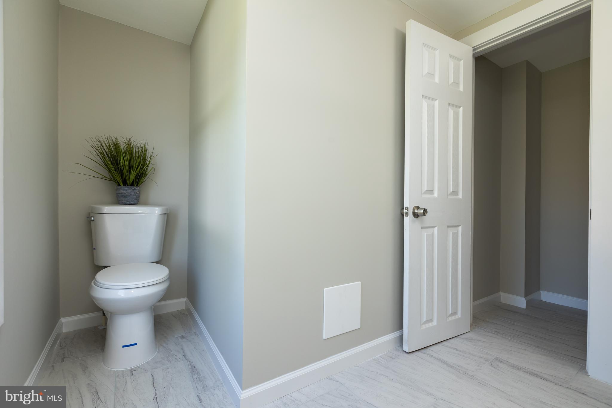 2407 Hammonds Ferry Road Halethorpe, MD 21227 - Photo 40 of 43 a bathroom with a toilet and a sink