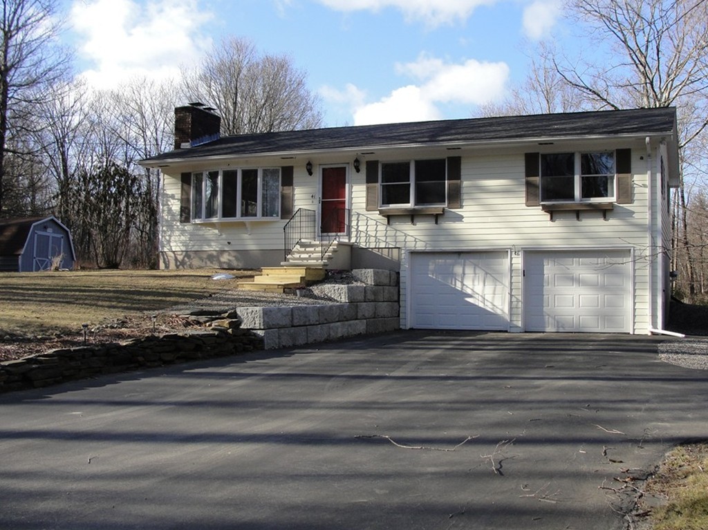 41 Allen Coit Road Huntington, MA 01050 - Photo 1 of 30 a front view of a house with a yard