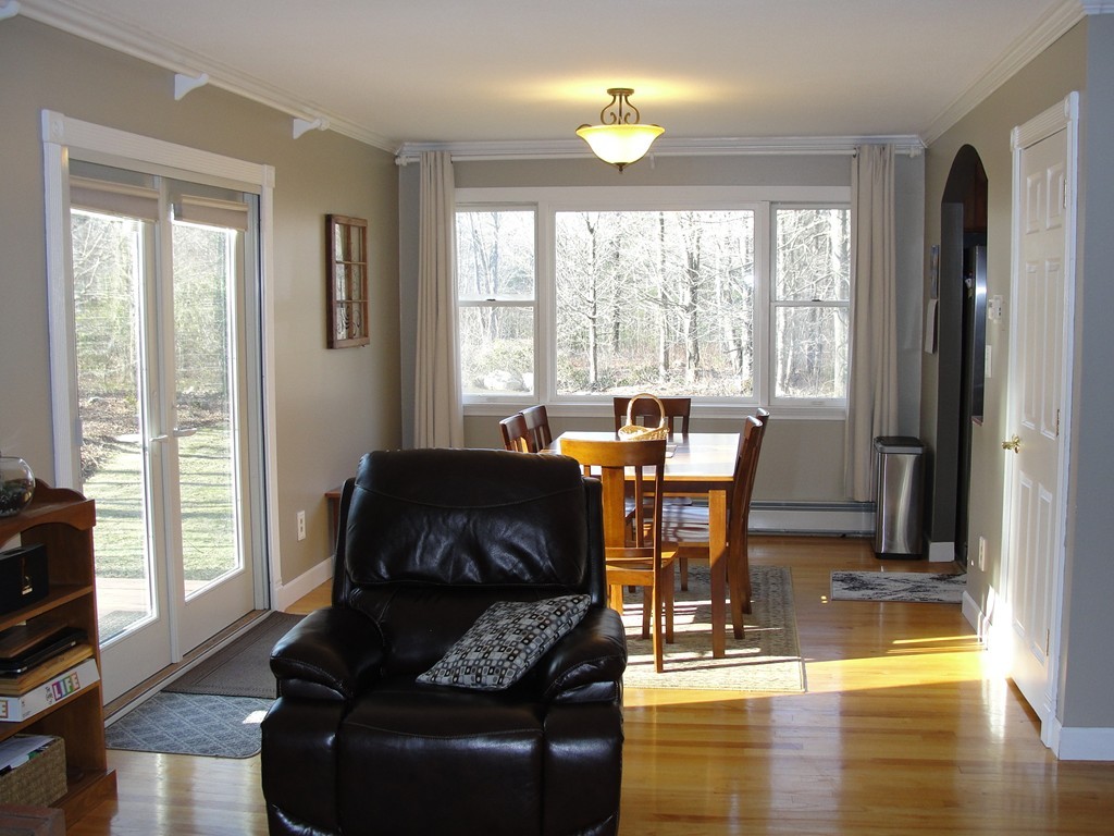 41 Allen Coit Road Huntington, MA 01050 - Photo 17 of 30 a living room with furniture and a large window