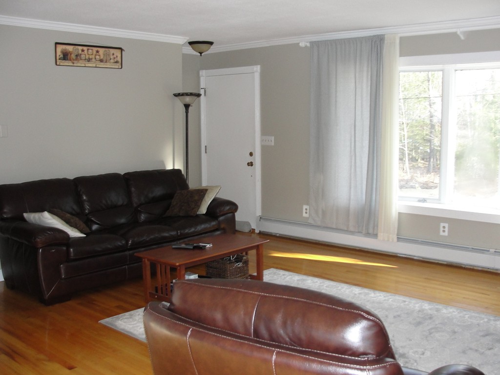 41 Allen Coit Road Huntington, MA 01050 - Photo 19 of 30 a living room with furniture and a window