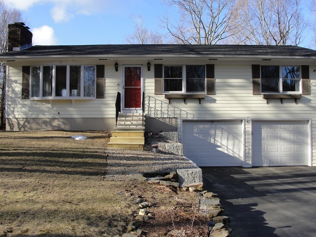 41 Allen Coit Road Huntington, MA 01050 - Photo 2 of 30 a house view with a garden space