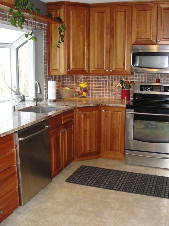 41 Allen Coit Road Huntington, MA 01050 - Photo 10 of 30 a kitchen with a sink stove and microwave