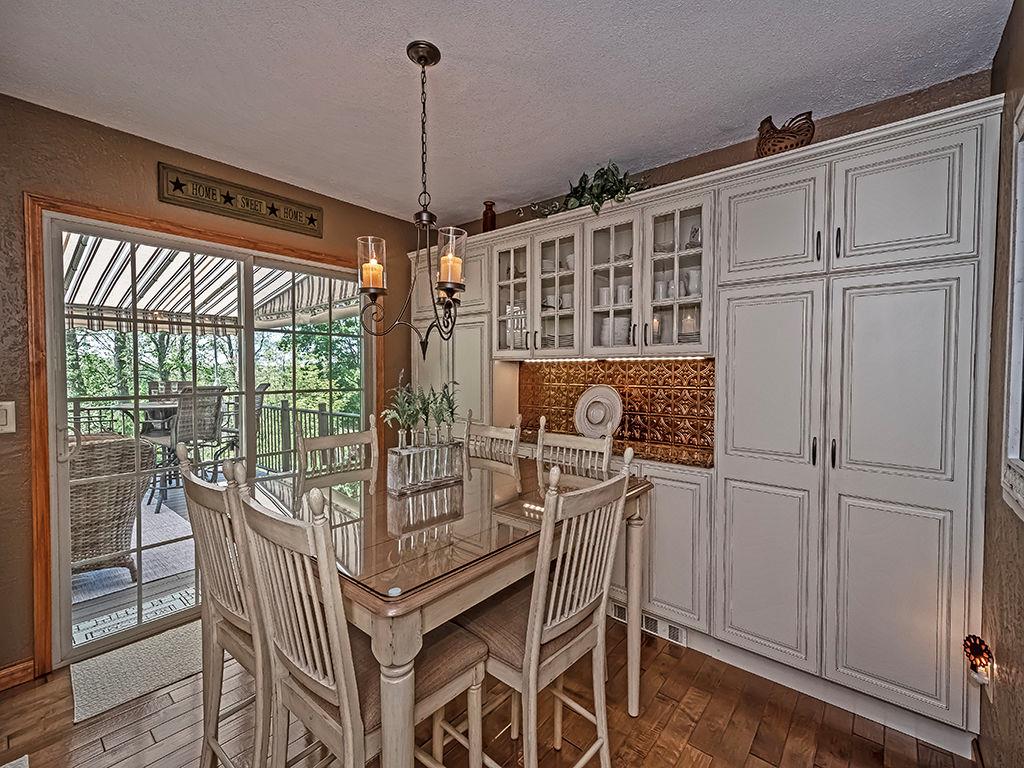 638 Knoll Lane Apollo, PA 15613 - Photo 9 of 30 a view of a dining room with furniture window and wooden floor