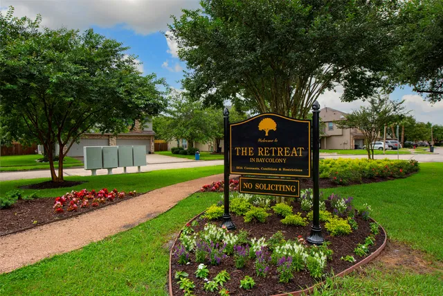 a sign on the side of the road