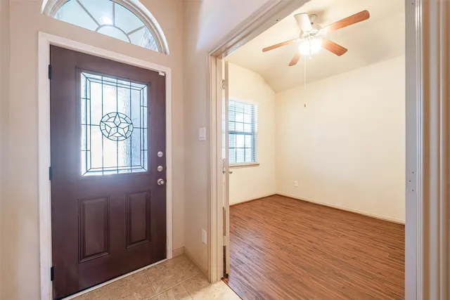 an empty room that has a window