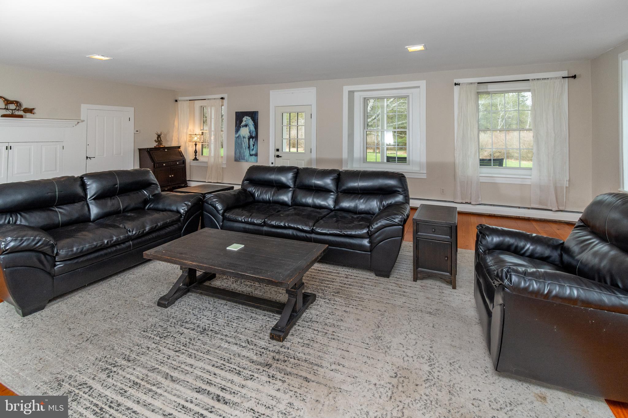 180 Municipal Road Pipersville, PA 18947 - Photo 16 of 60 Spacious Living Rm w/Doorway to the Rear Porch