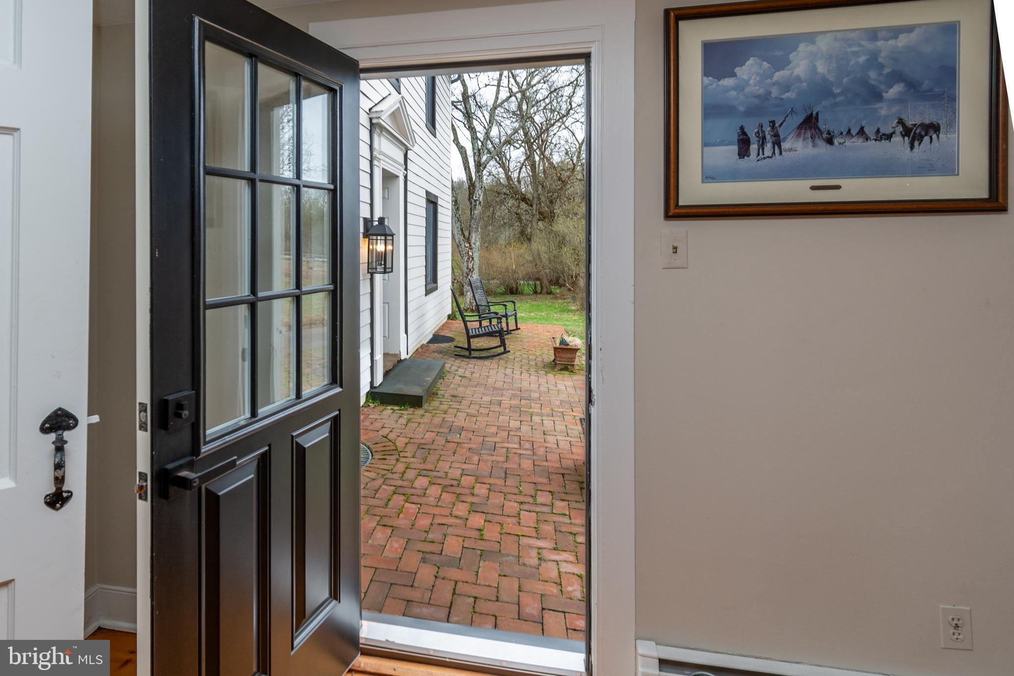 180 Municipal Road Pipersville, PA 18947 - Photo 20 of 60 Living Room Doorway Leading out to the Patio